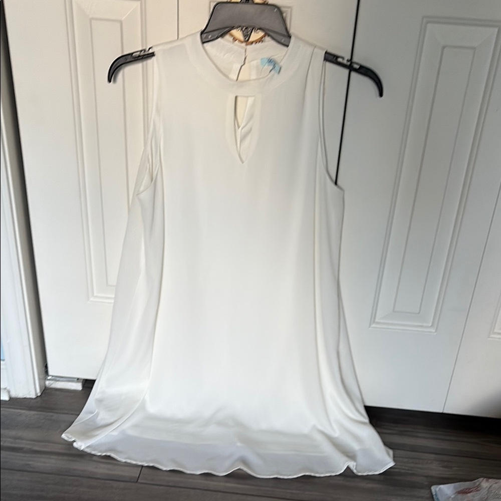 Elegant White Sleeveless Blouse